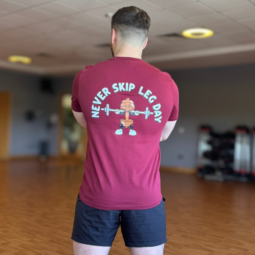 🥉Never Skip Leg Day - Bronze Level on Burgundy tee - Squat