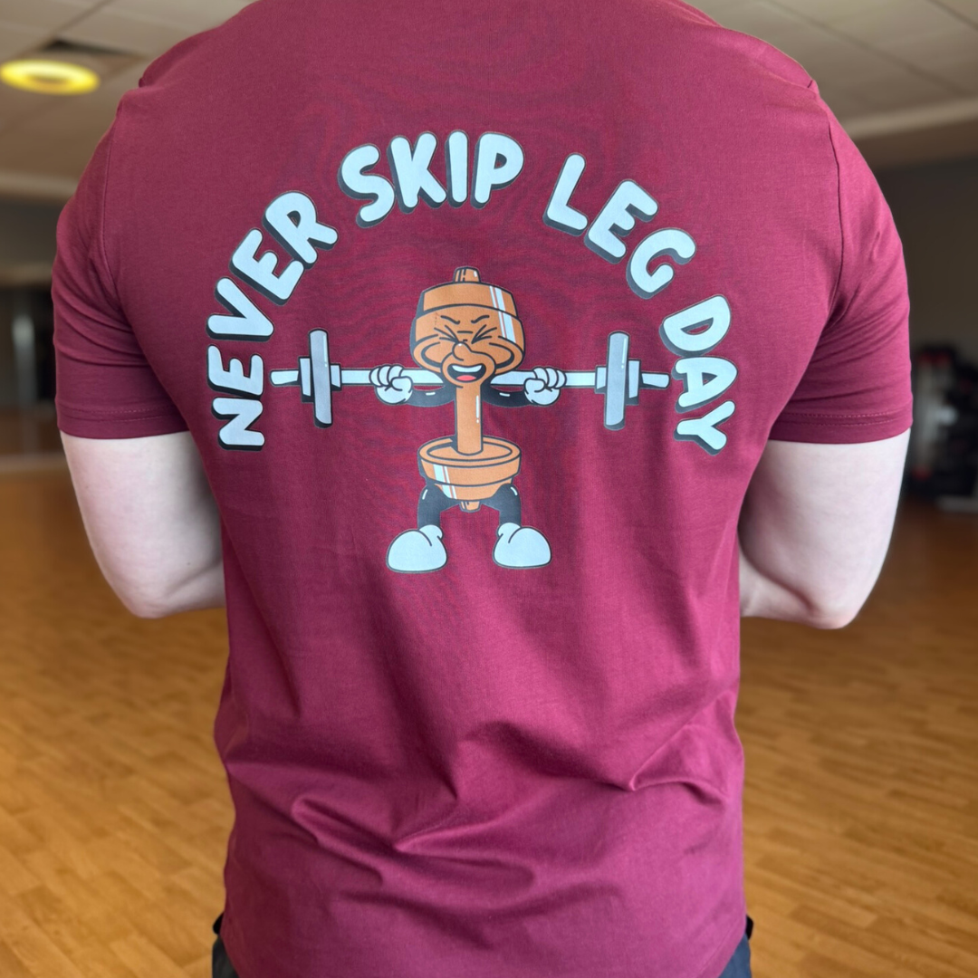 🥉Never Skip Leg Day - Bronze Level on Burgundy tee - Squat